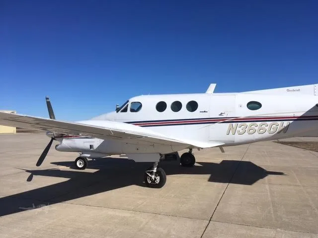 Exterior view of a 1979 BEECHCRAFT KING AIR E90, N366GW.