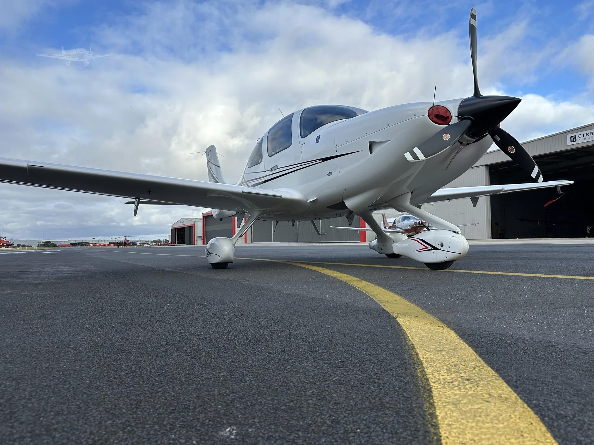 Exterior view of a 2017 CIRRUS SR20-G6, VH-ZPZ.