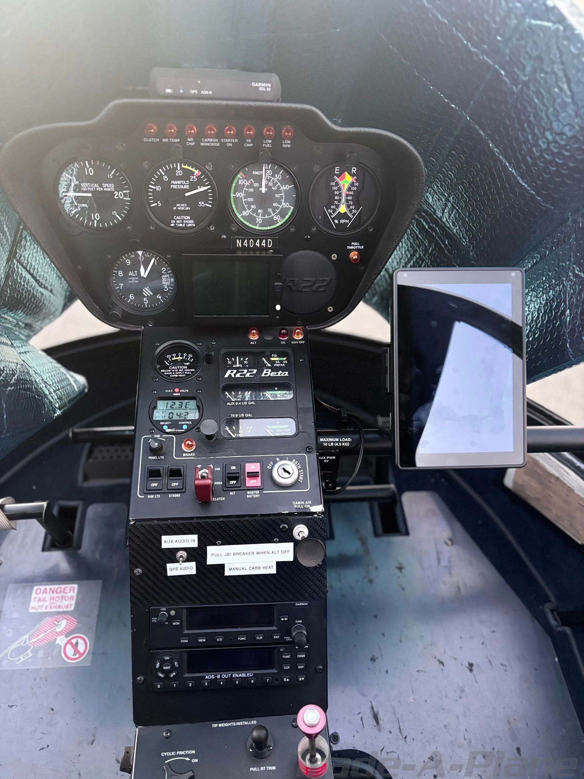 Cockpit and instrument panel of a 1990 ROBINSON R22 BETA II.