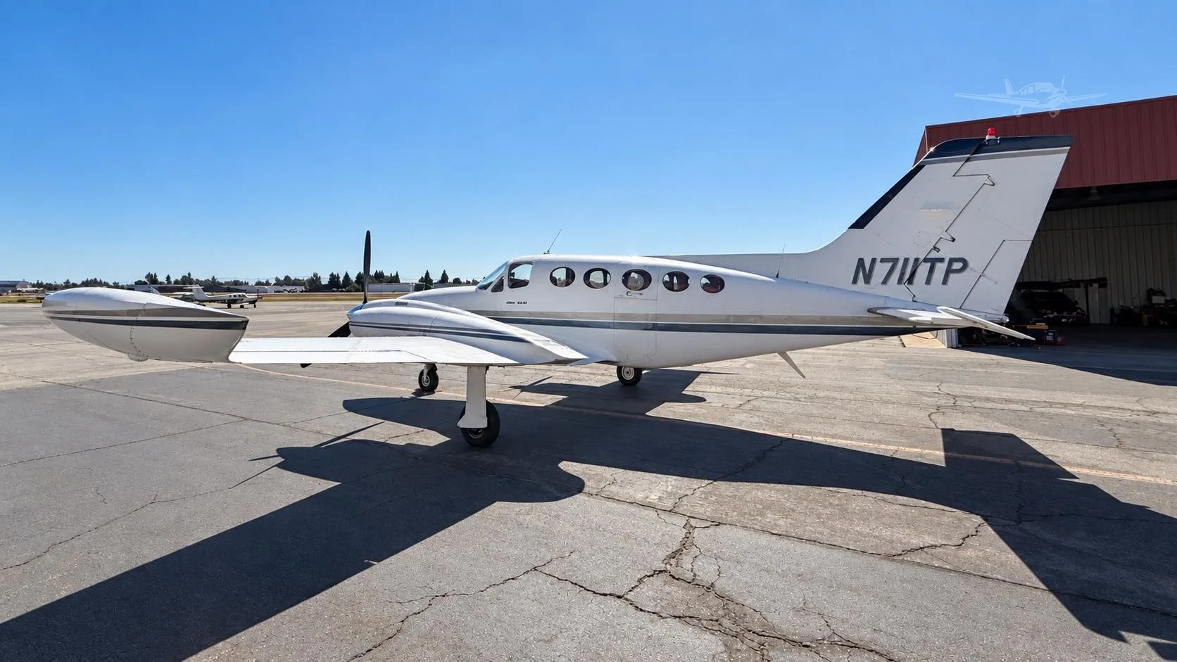 Exterior view of a 1973 CESSNA 421B, N711TP.