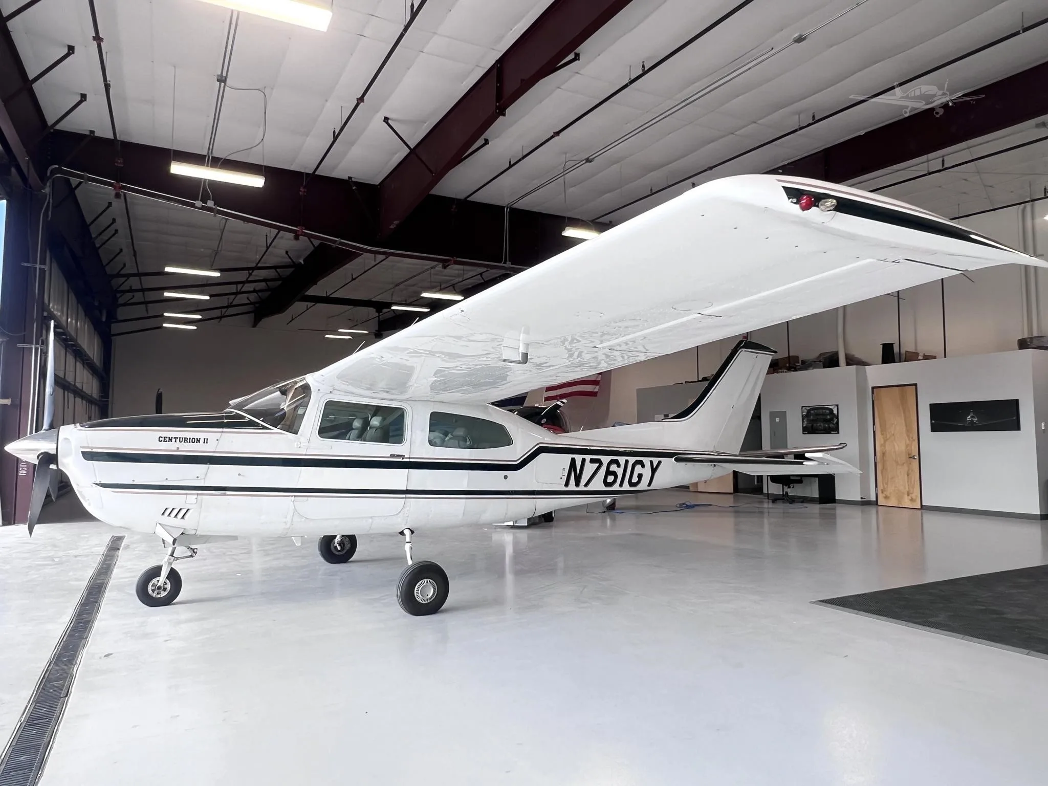 Exterior view of a 1977 CESSNA TURBO 210M, N761GY.