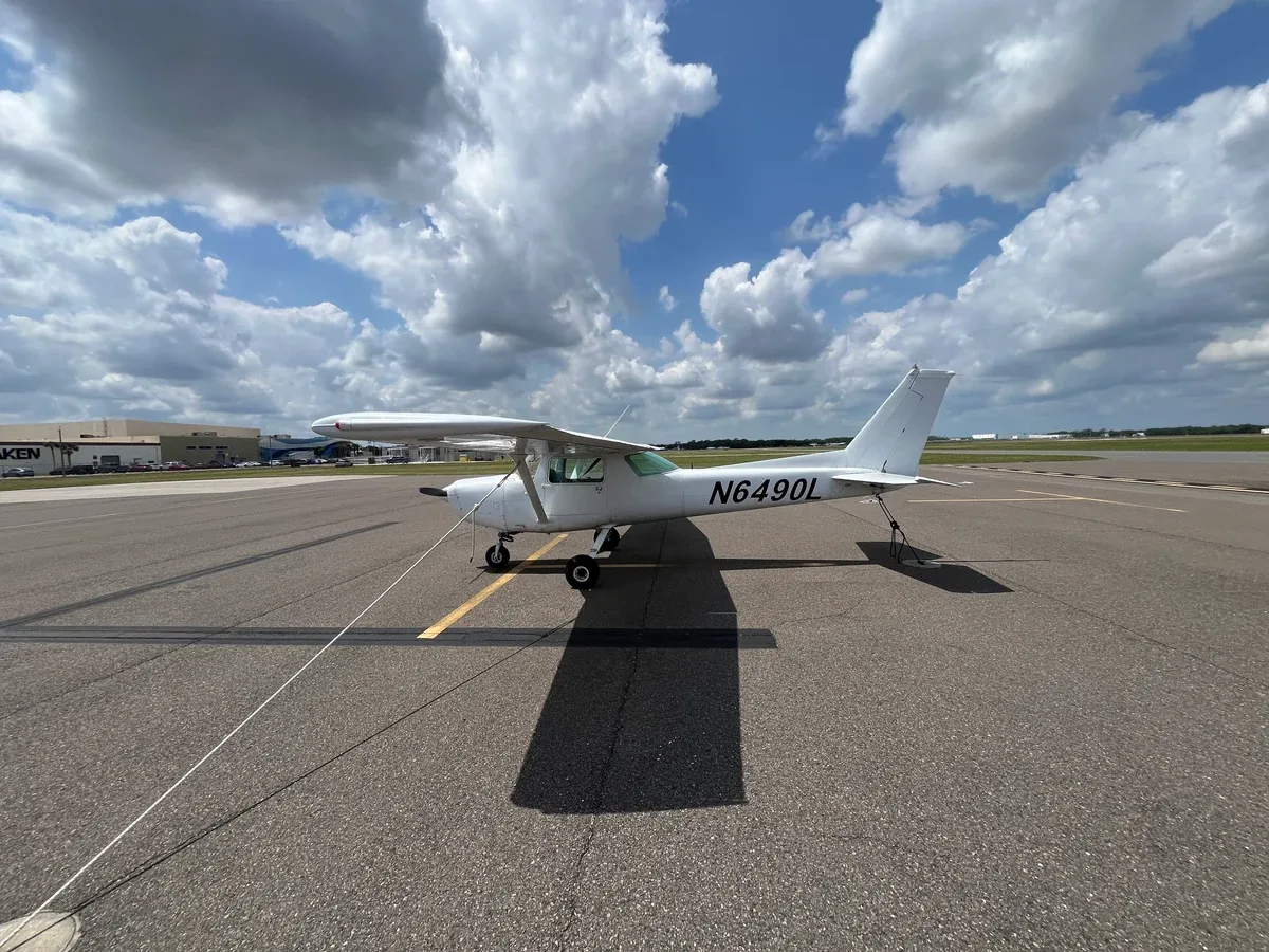 Exterior view of a 1978 Cessna 152, N6490L.
