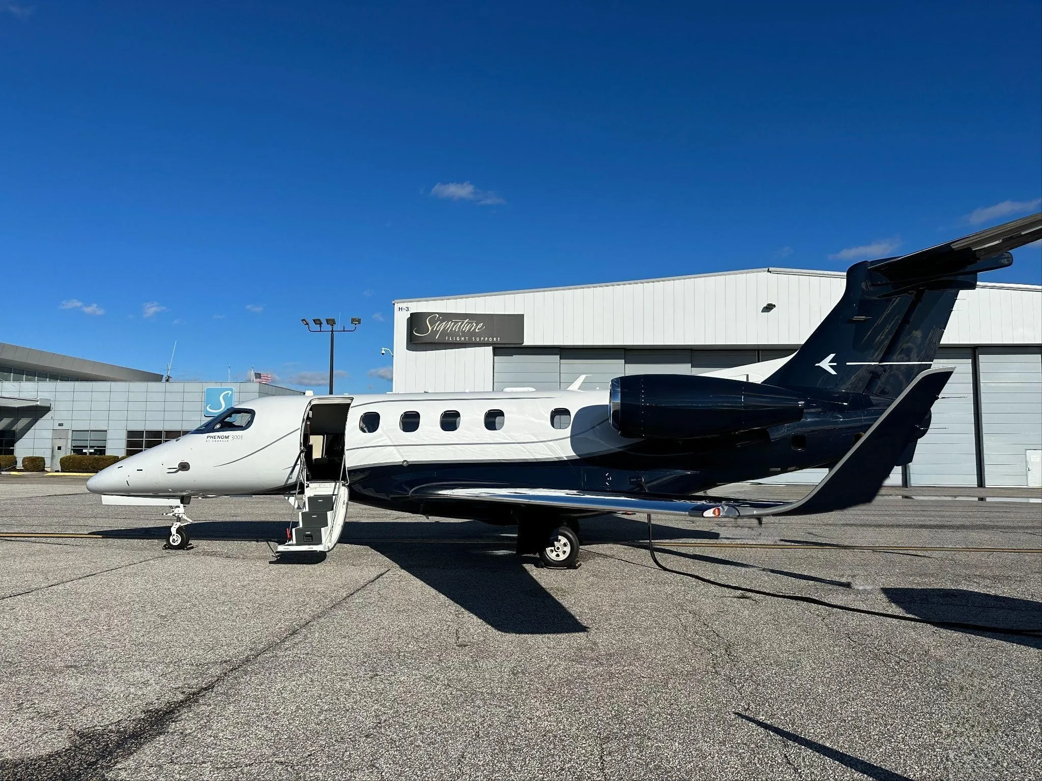 Exterior view of a 2023 EMBRAER PHENOM 300E.