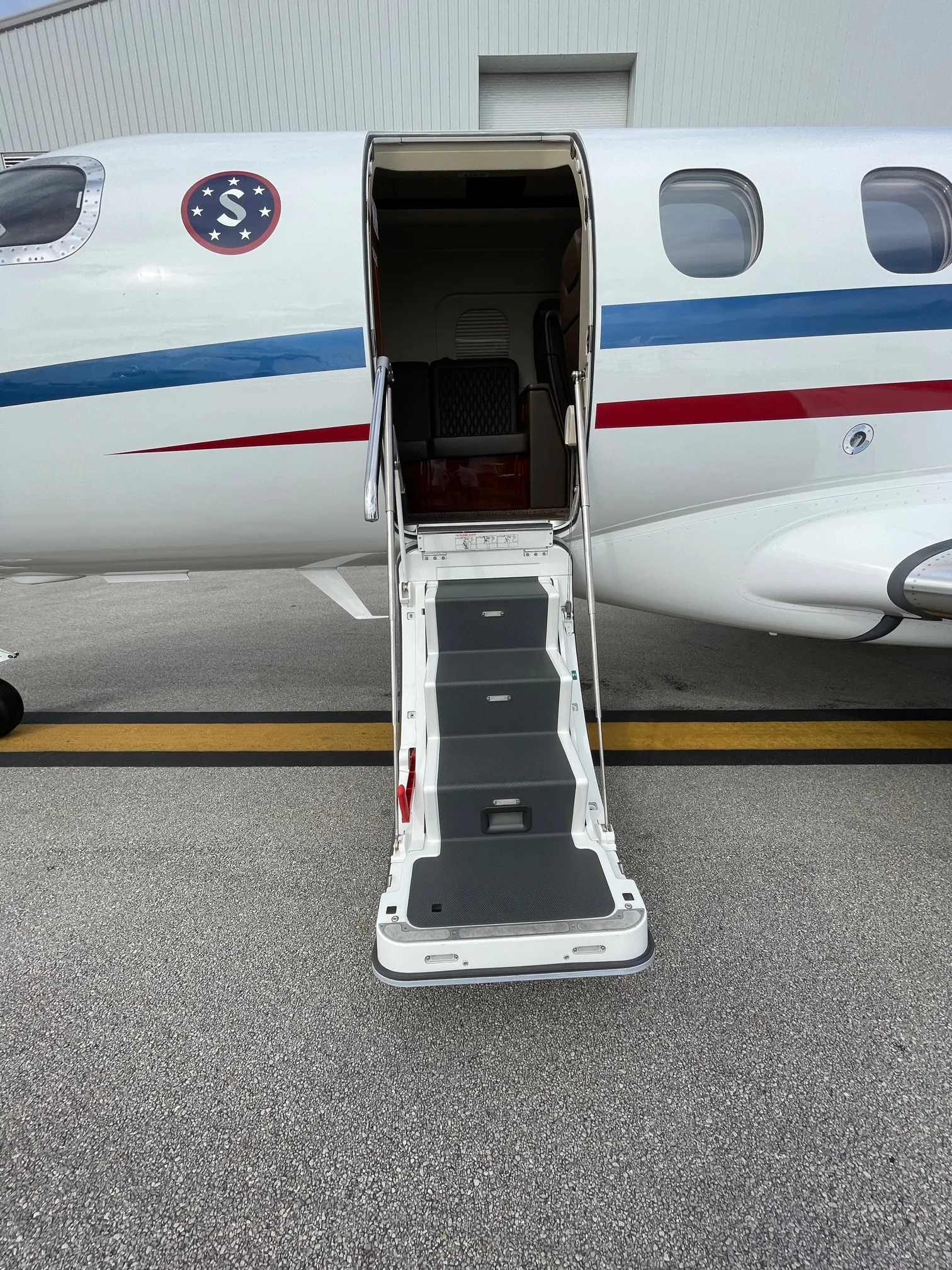 Cabin interior of a 2019 Embraer Phenom 300E.
