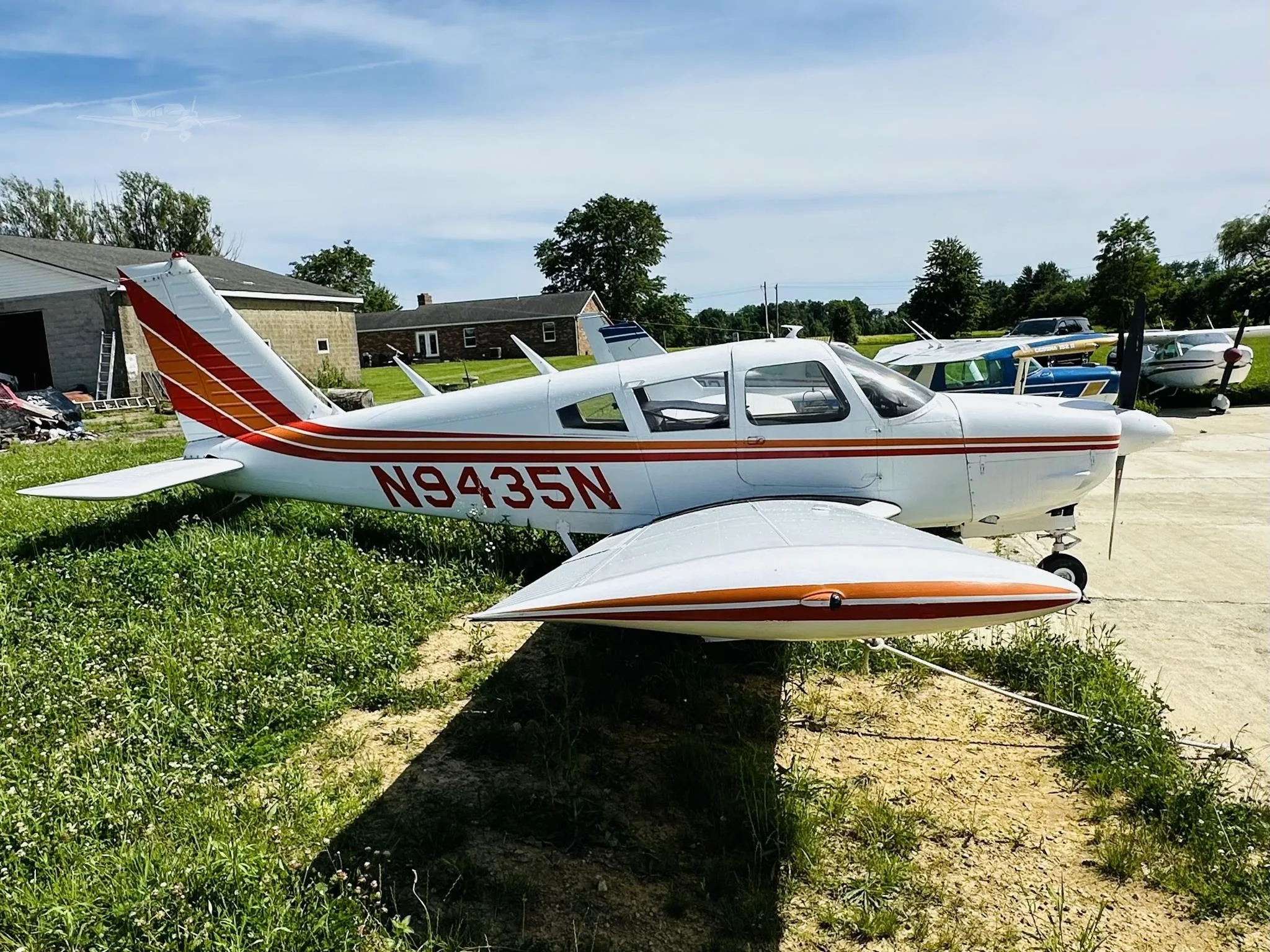 Exterior view of a 1969 PIPER ARROW, N9435N.