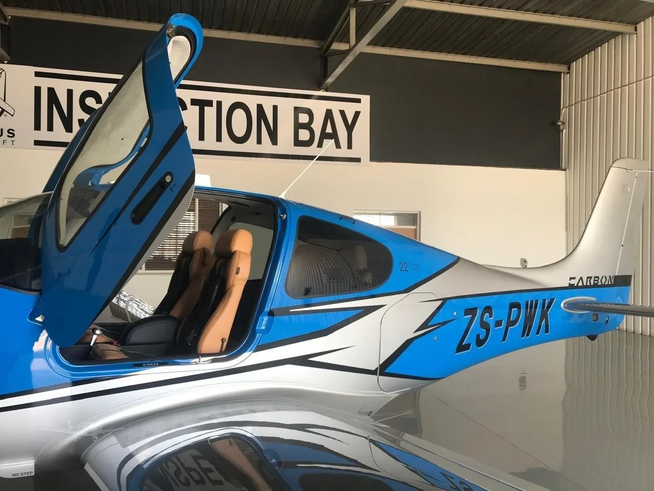 Exterior view of a 2019 CIRRUS SR22-G6, ZS-PWK.