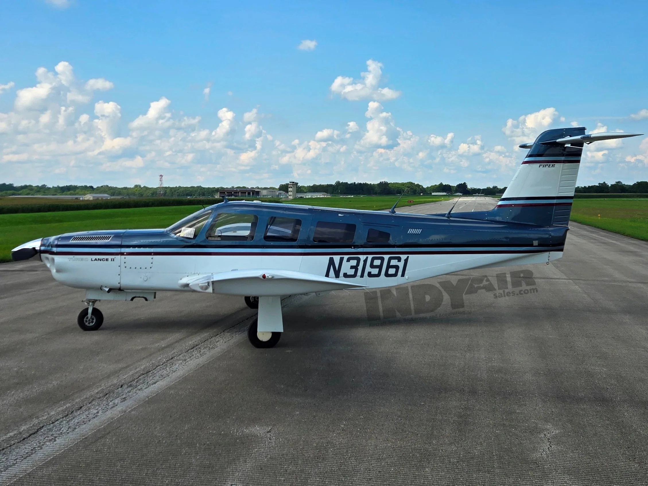 Exterior view of a 1978 Piper 32RT-300T, N31961.