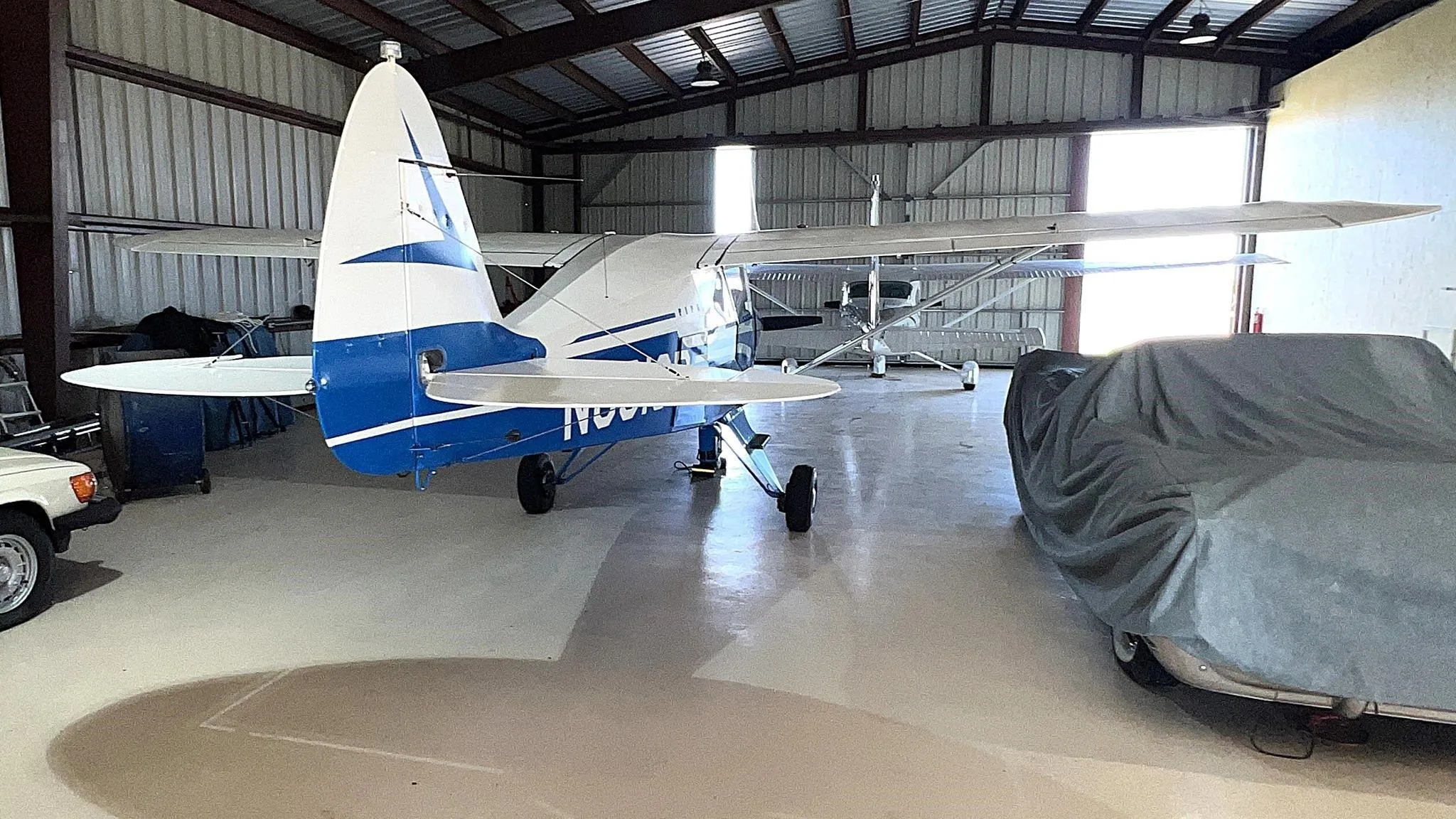 Exterior view of a 1958 Piper PA-22-160 Tri-Pacer.