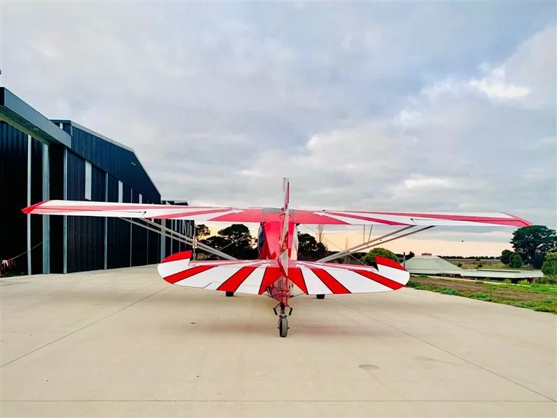 Exterior view of a 1979 American Champion 8KCAB, VH-BIA.