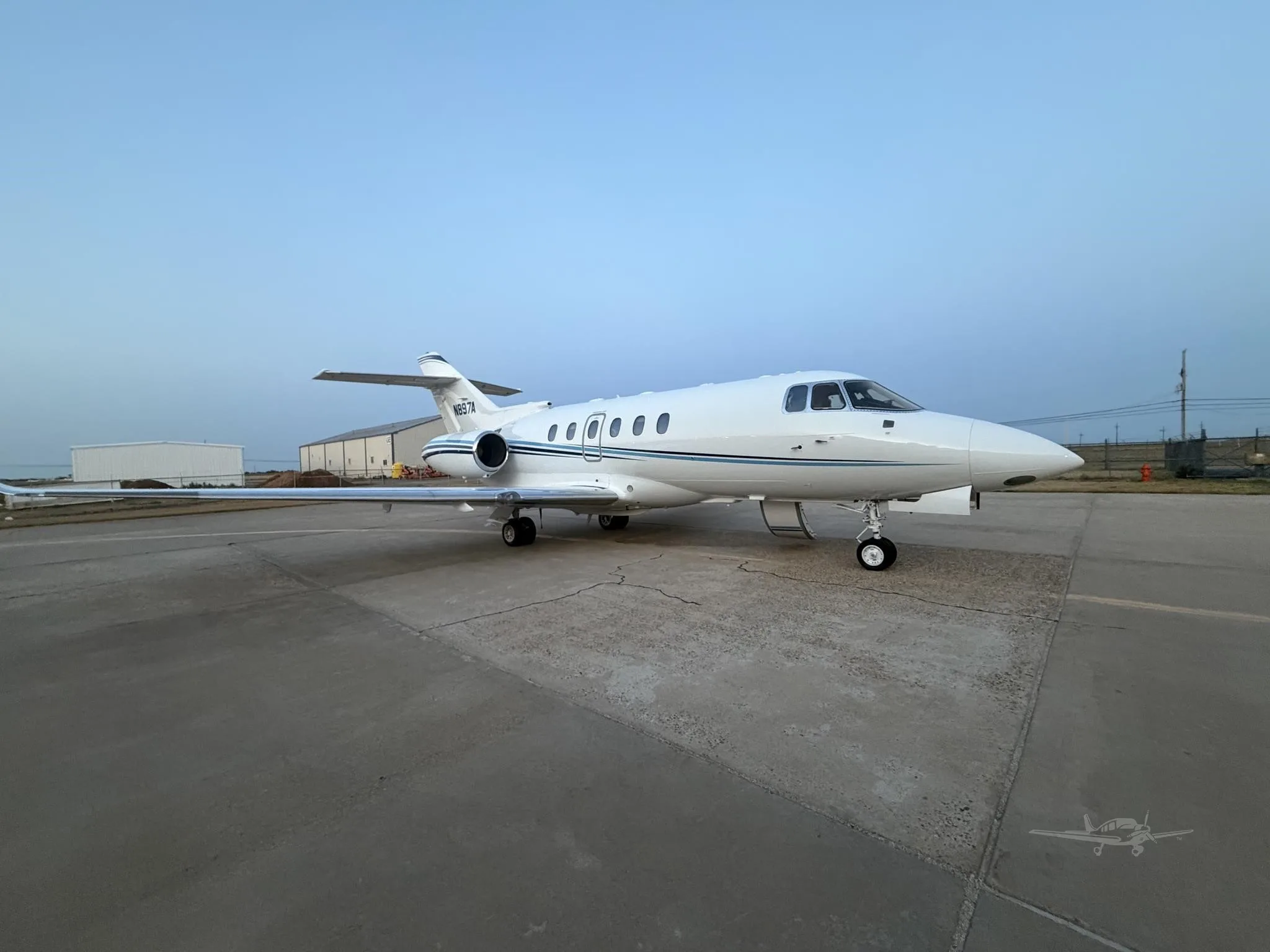 Exterior view of a 1997 HAWKER 800XP, N897A.