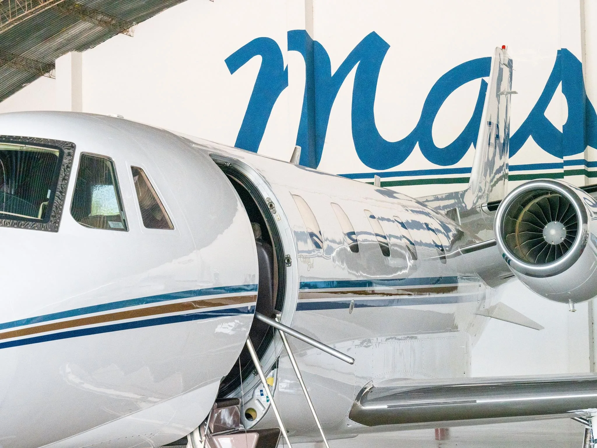Exterior view of a 1998 CESSNA CITATION EXCEL, ZP-ADE.