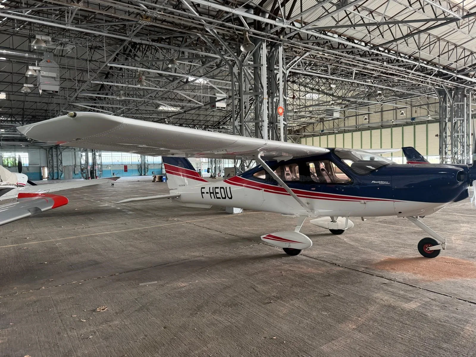 Exterior view of a 2020 TECNAM P2010 MKII, F-HEDU.