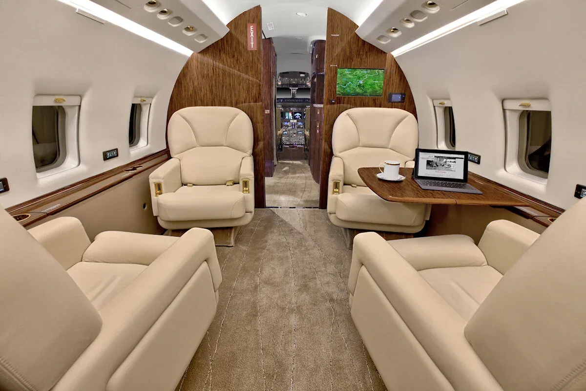 Cabin interior of a 1997 Bombardier Challenger 604 — Thoroughbred Aviation.