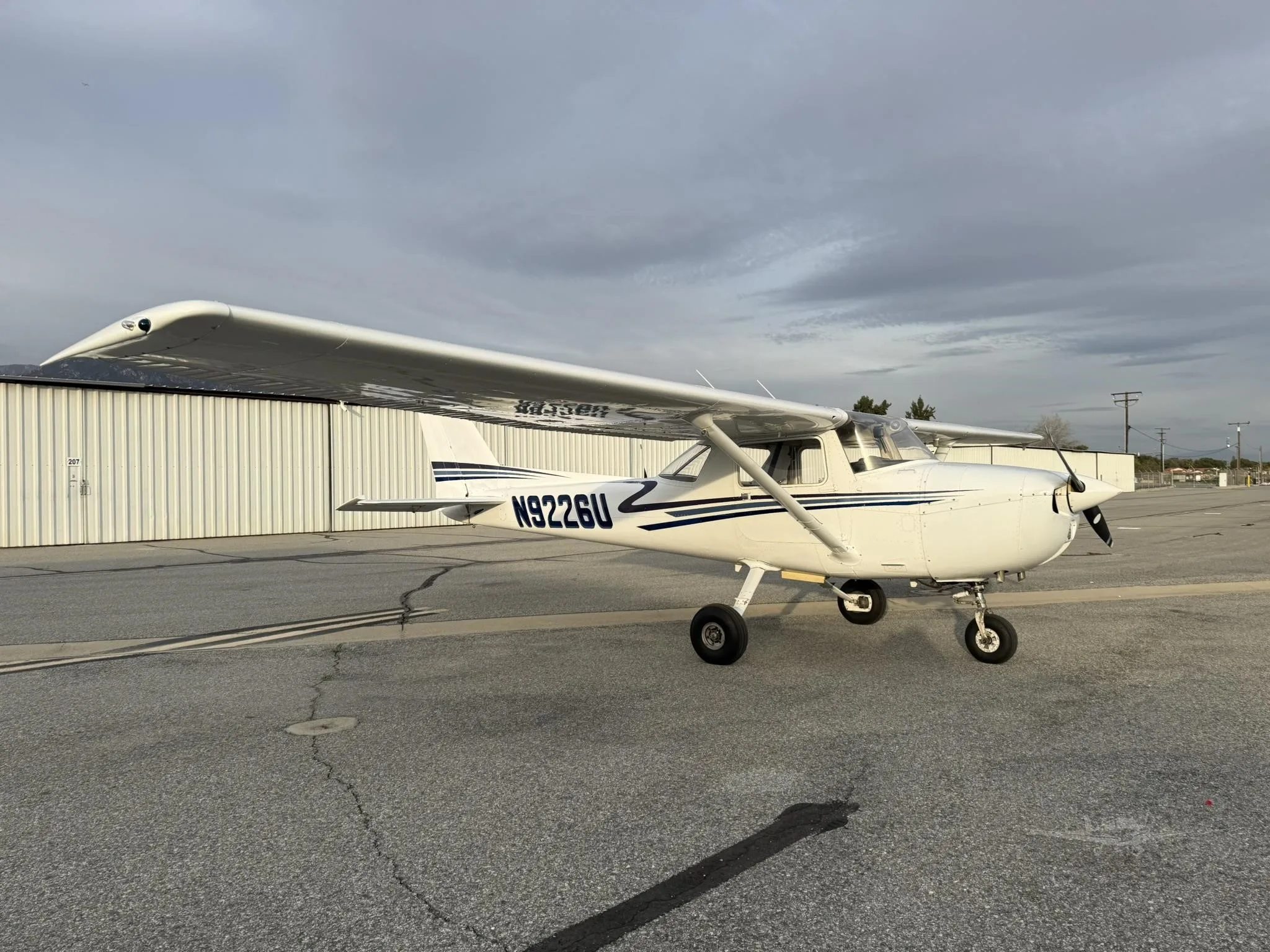 Exterior view of a 1976 CESSNA 150, N9226U.