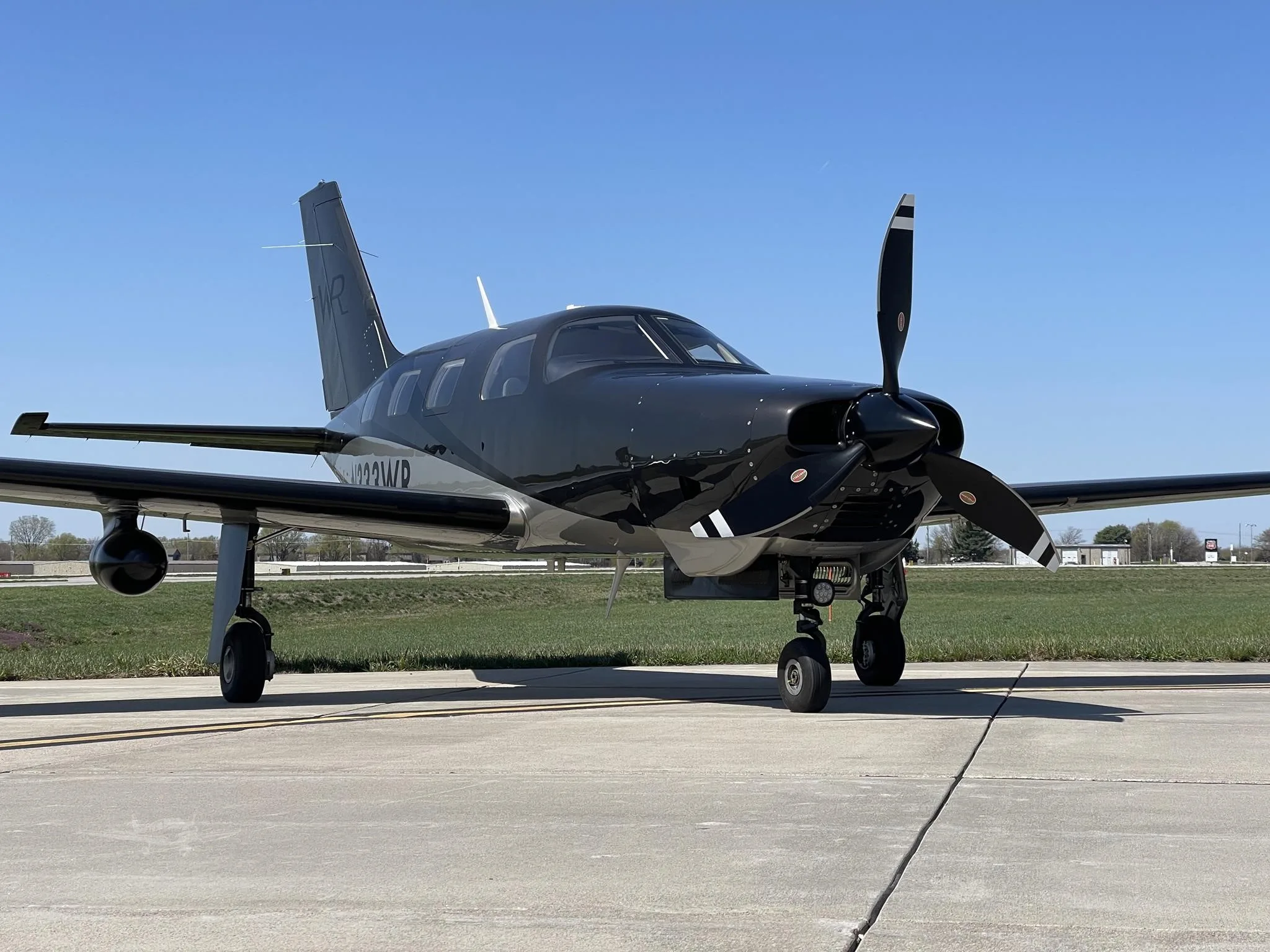 Exterior view of a 2022 PIPER M350, N333WR.