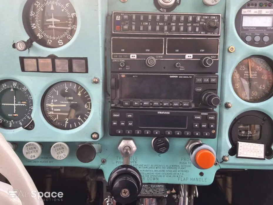 Cockpit and instrument panel of a 1961 Mooney M20B Mark 21.