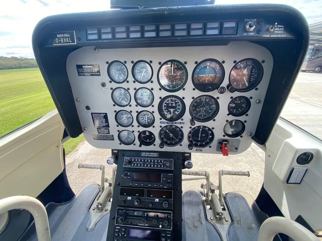 Cockpit and instrument panel of a 1980 Bell 206B-3 JetRanger.