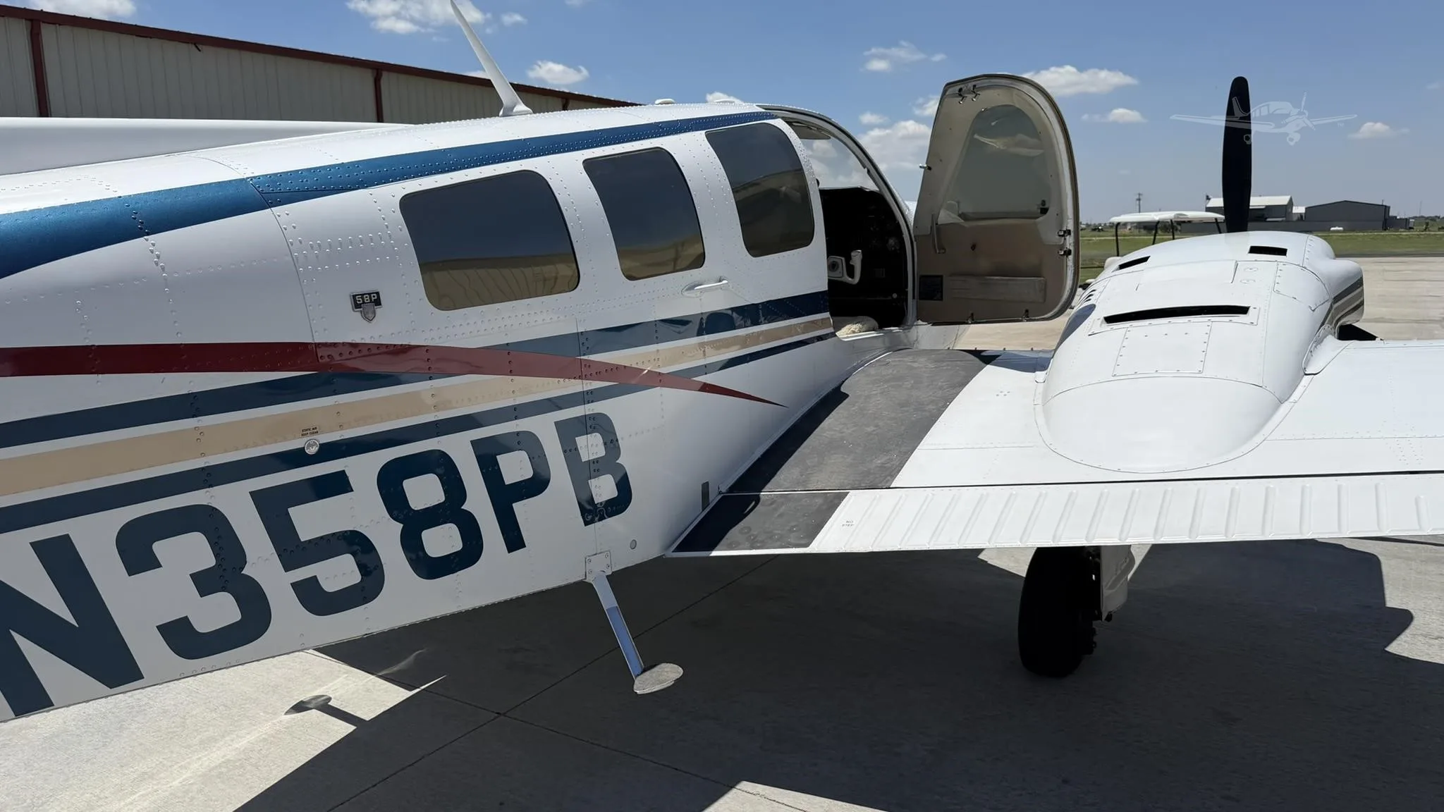 Exterior view of a 1977 BEECHCRAFT 58P BARON, N358PB.