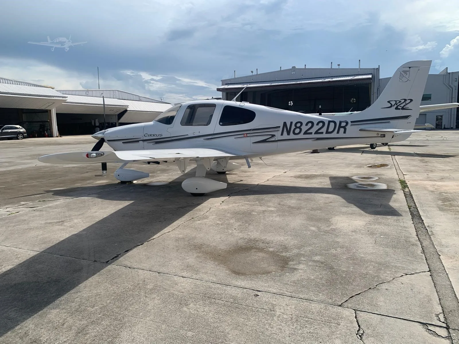 Exterior view of a 2003 CIRRUS SR22, N822DR.
