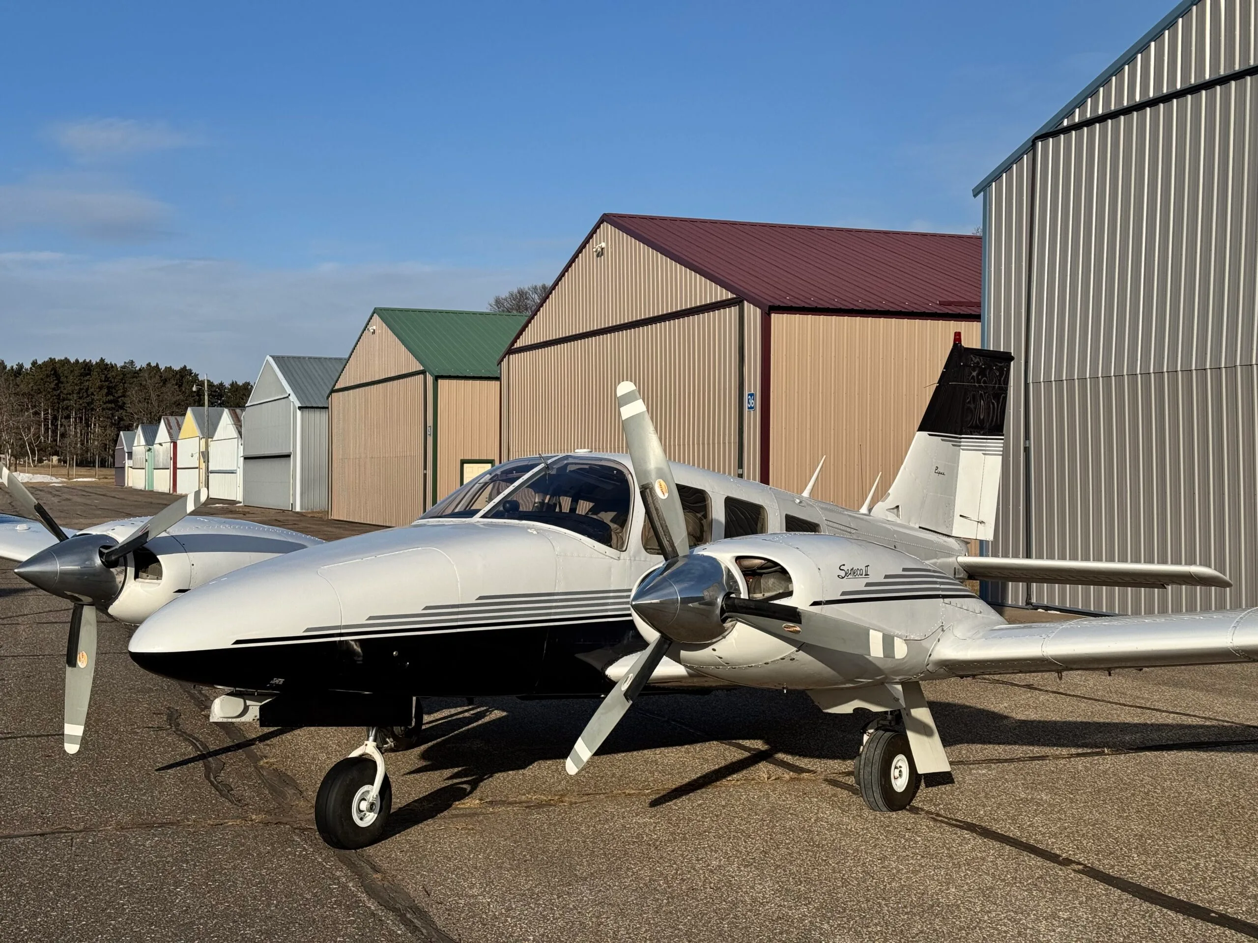 Exterior view of a 1975 Piper Seneca II, N33156.