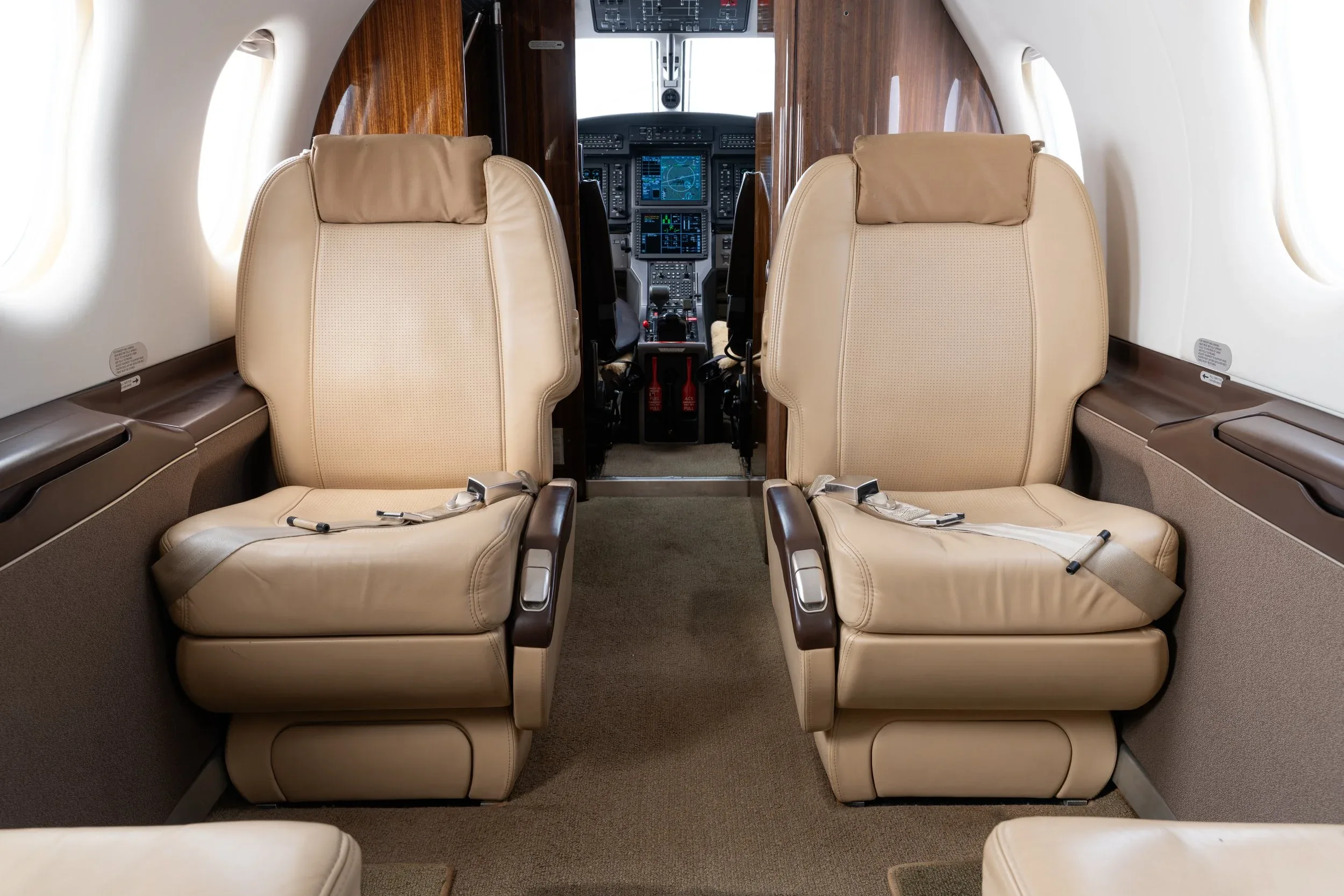 Cabin interior of a 2010 Pilatus PC-12 NG — Aircraft Executives.