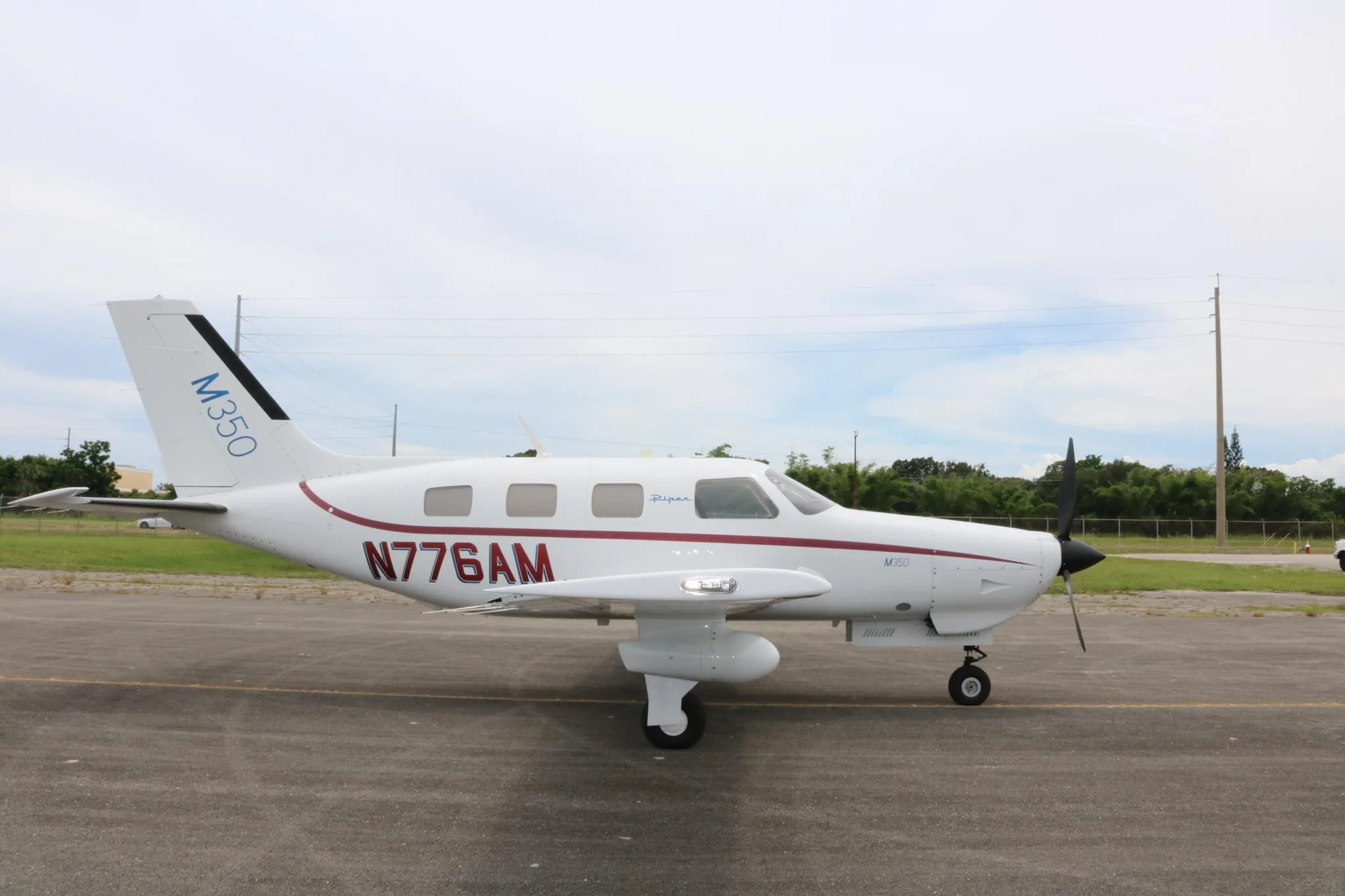 Exterior view of a 2026 PIPER M350, N776AM.