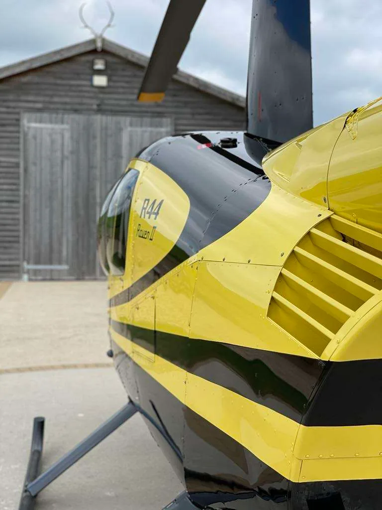 Exterior view of a 2002 Robinson R44 Raven II.