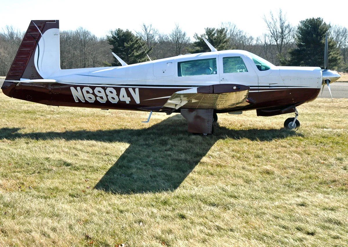 Cockpit and instrument panel of a 1976 Mooney M20F Executive.