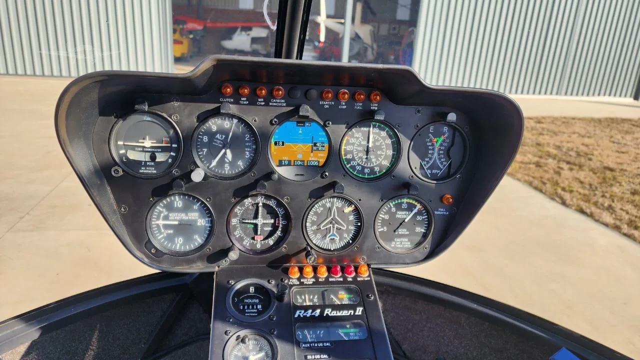 Cockpit and instrument panel of a 2007 ROBINSON R44 RAVEN II.