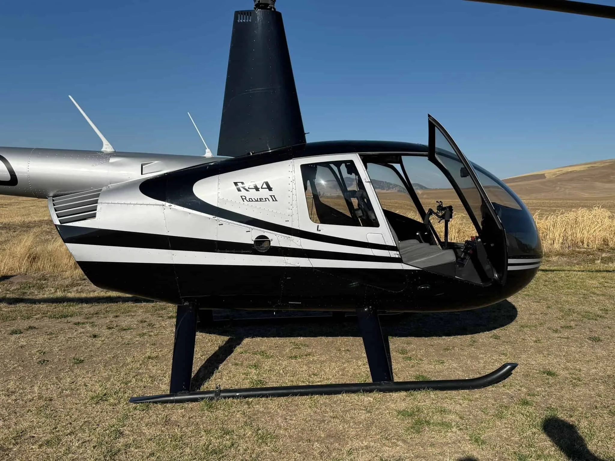 Exterior view of a 2010 Robinson R44 II.