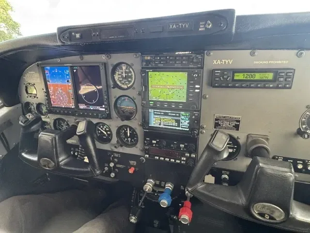 Cockpit and instrument panel of a 2003 Cessna T206H.