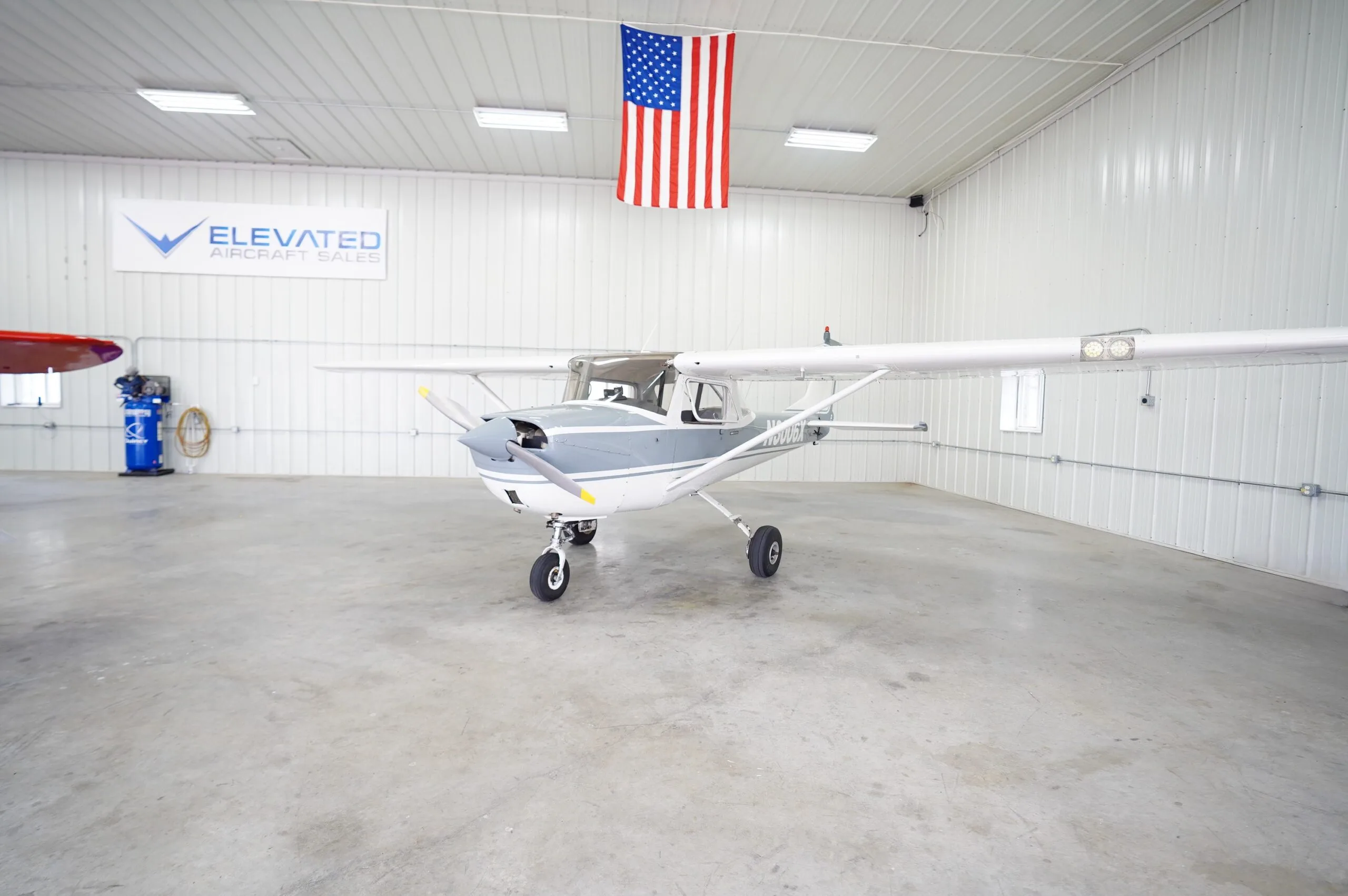 Exterior view of a Cessna 150F, N3006X.