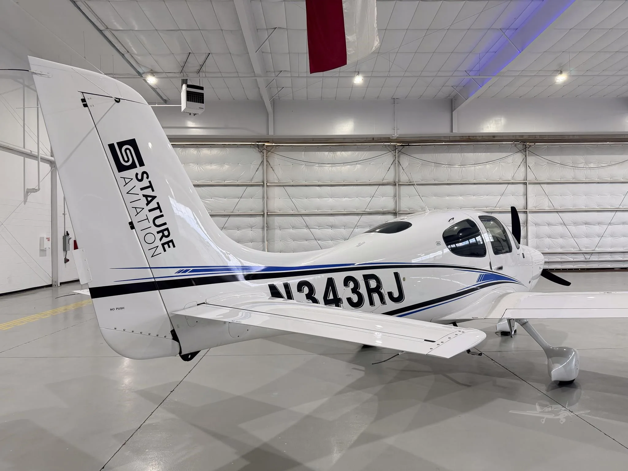 Exterior view of a 2022 CIRRUS SR20-G6, N343RJ.
