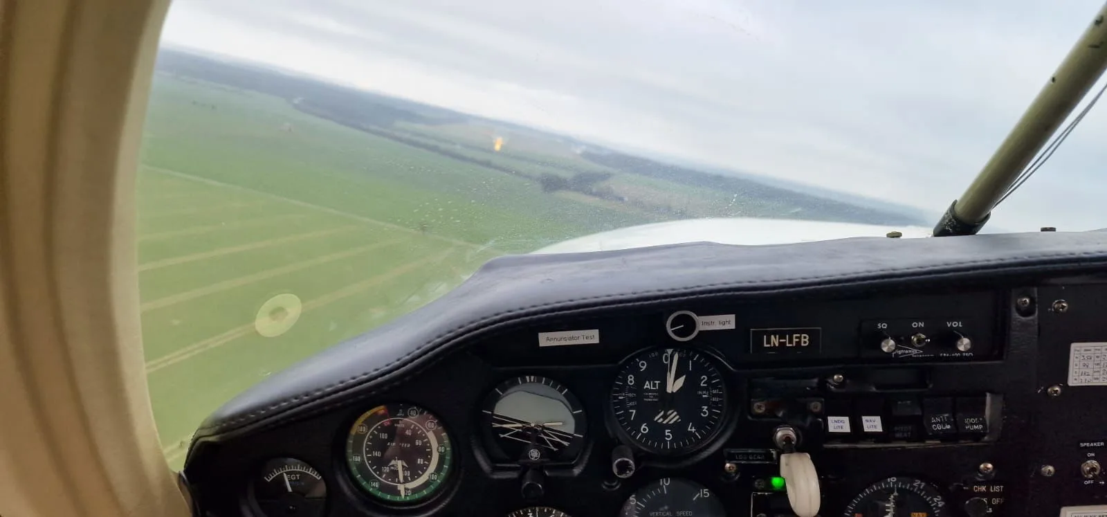 Cockpit and instrument panel of a 1969 Mooney M20C Ranger.