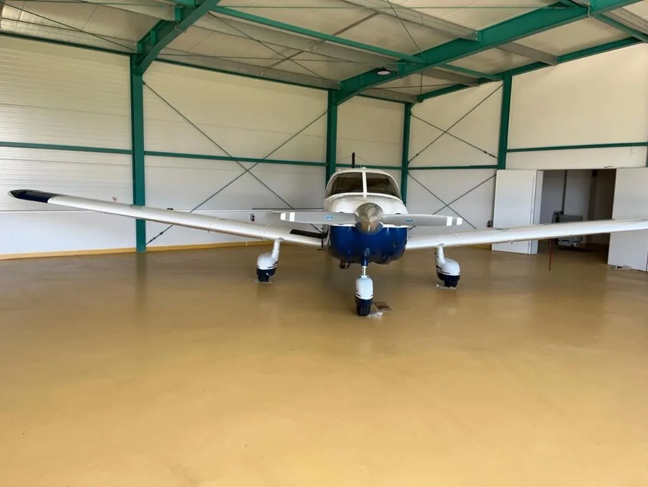 Exterior view of a 1994 Piper PA-28-181 Archer III.