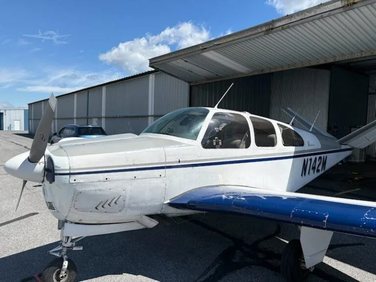 Exterior view of a 1961 BEECHCRAFT N35 BONANZA, N142M.