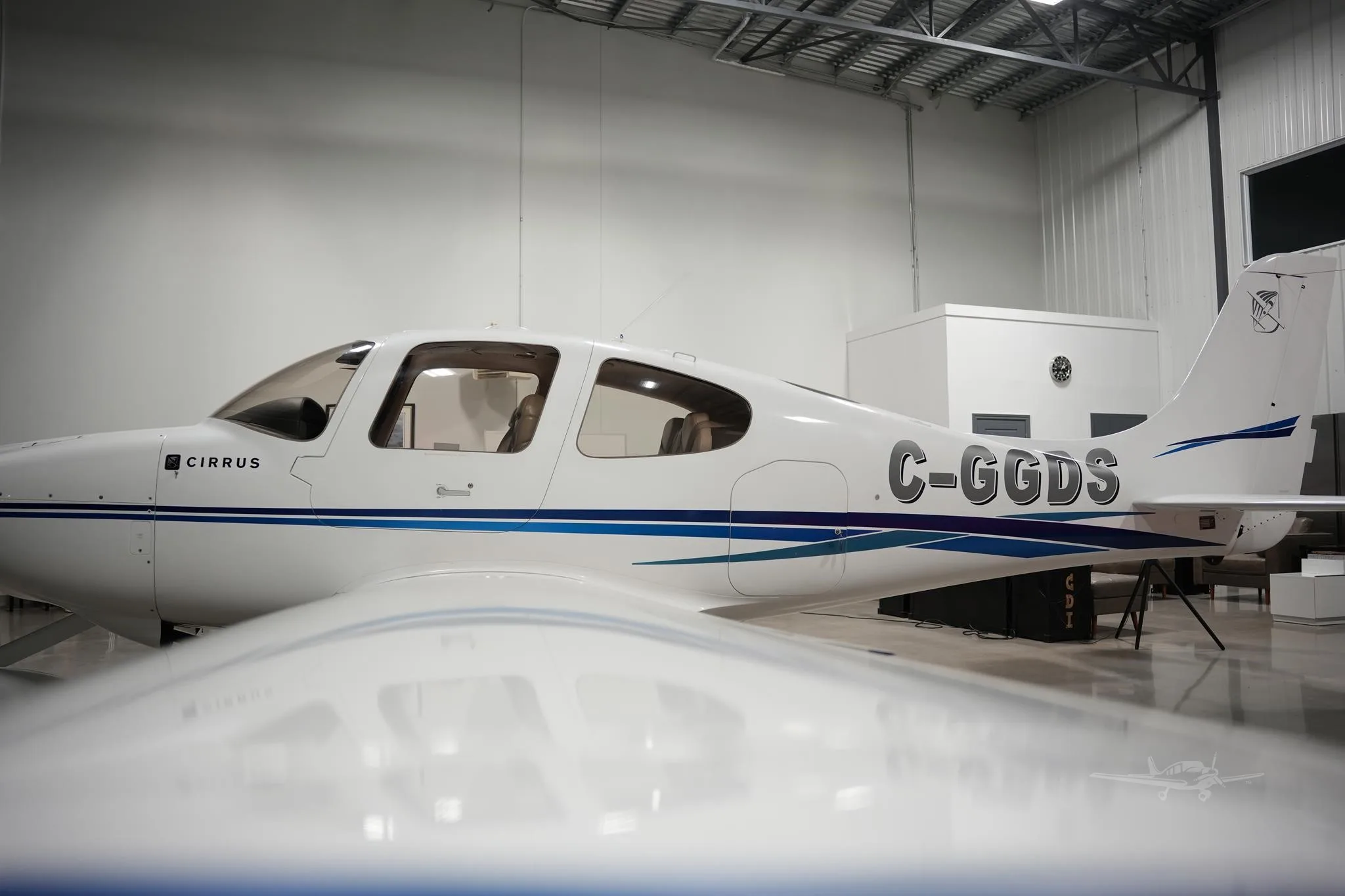 Exterior view of a 2003 CIRRUS SR20, C-GGDS.