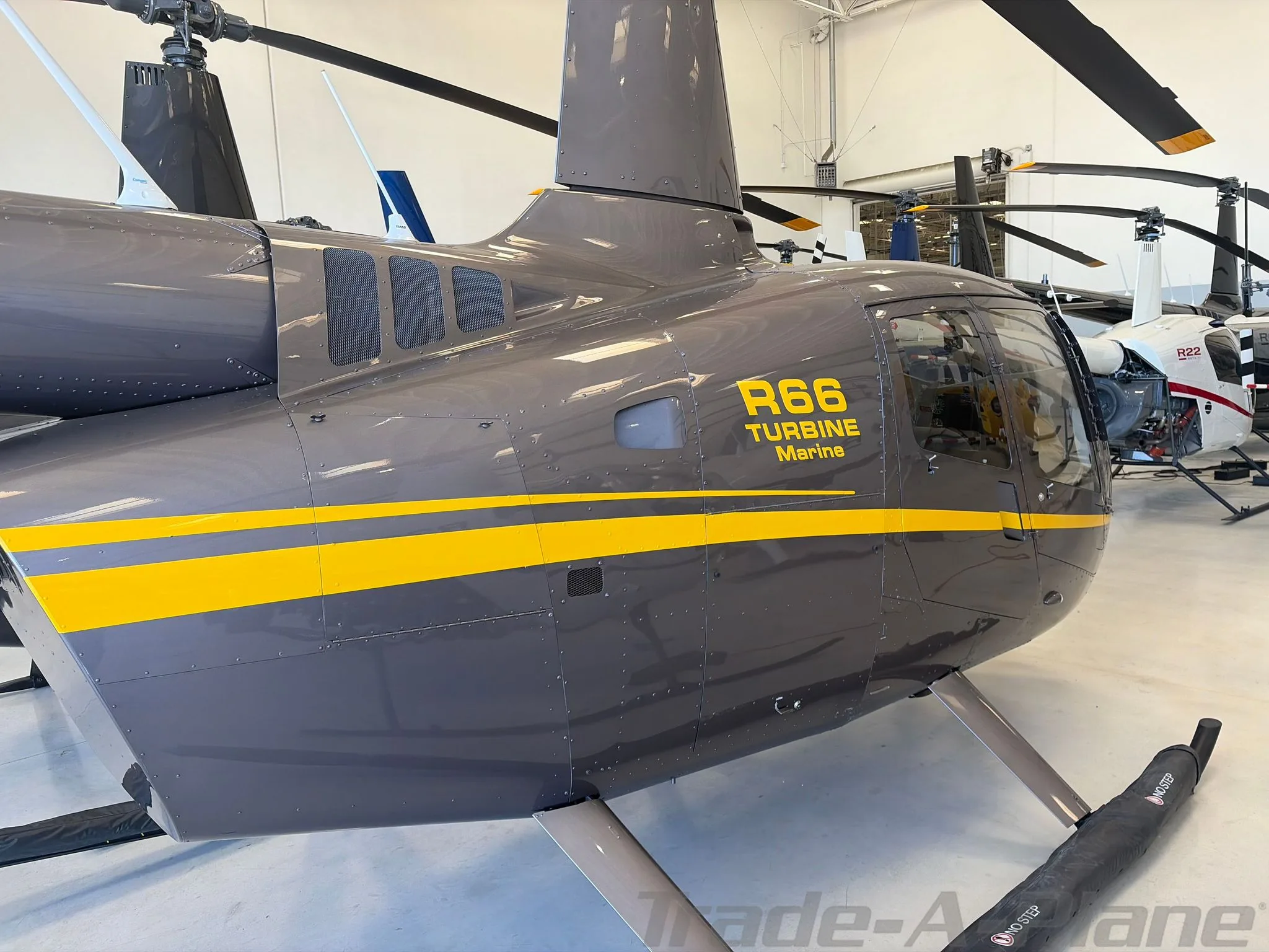 Cockpit and instrument panel of a 2016 ROBINSON R66 TURBINE MARINE.