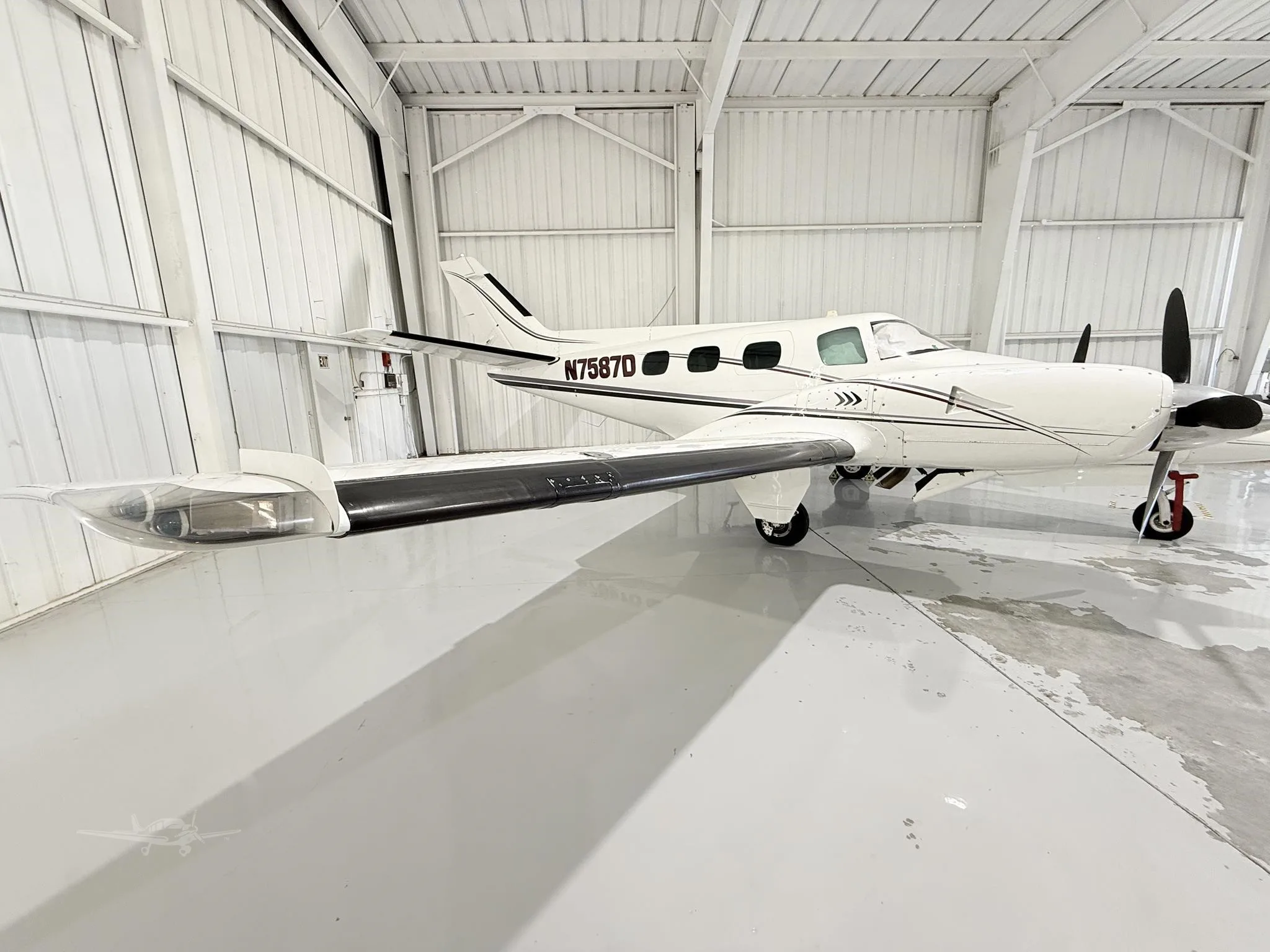 Exterior view of a 1971 BEECHCRAFT A60 DUKE, N7587D.