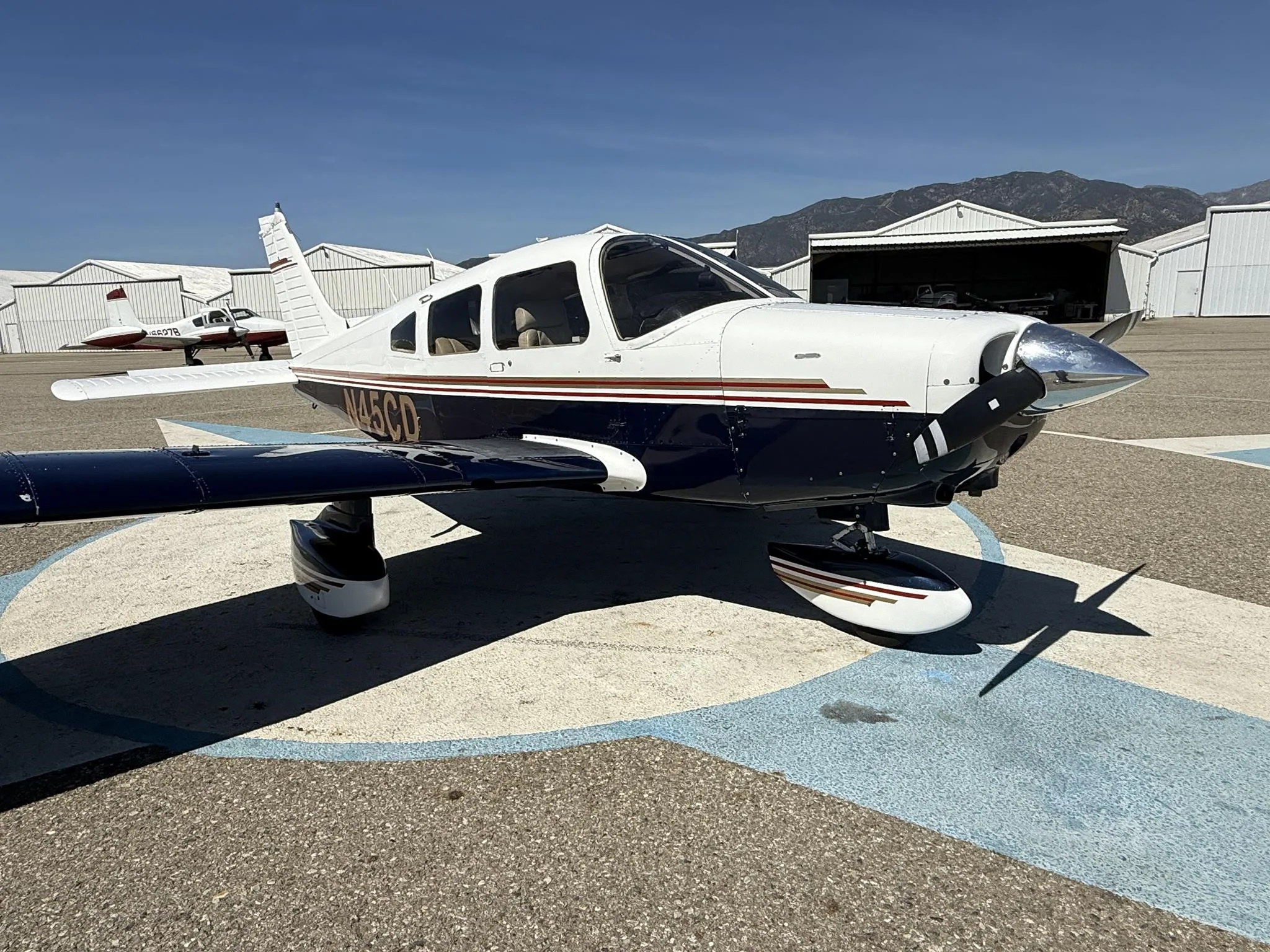 Exterior view of a 1979 PIPER WARRIOR II, N45CD.