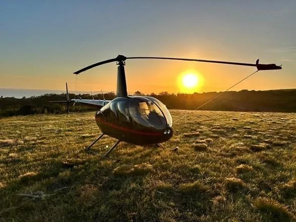 Exterior view of a 2017 ROBINSON R44 RAVEN II, ZT-HAE.