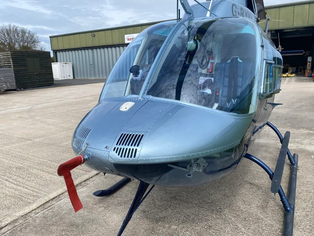 Exterior view of a 1980 Bell 206B-3 JetRanger, G-BXKL.