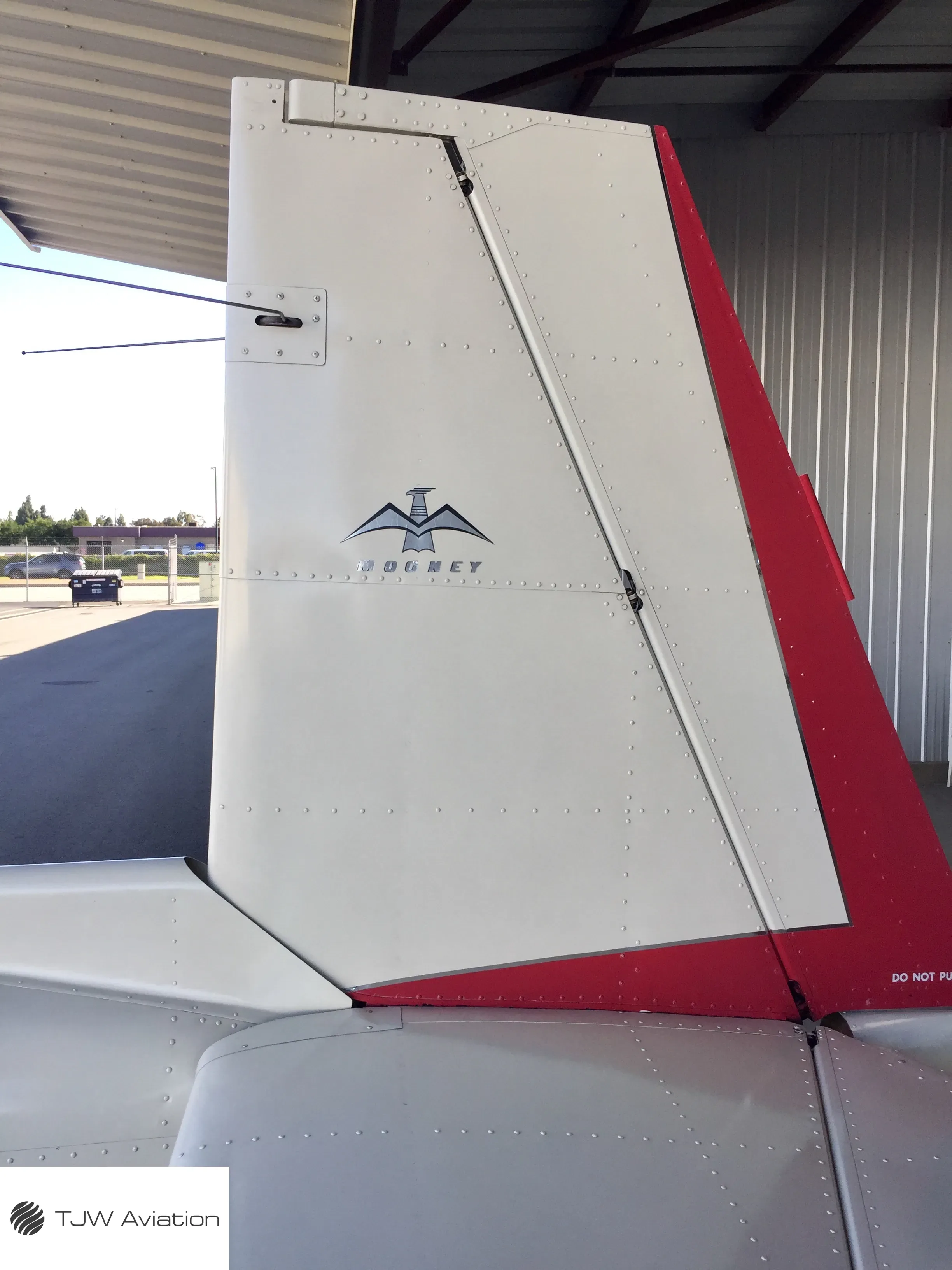 Exterior view of a 1966 Mooney M20C, N2587W.