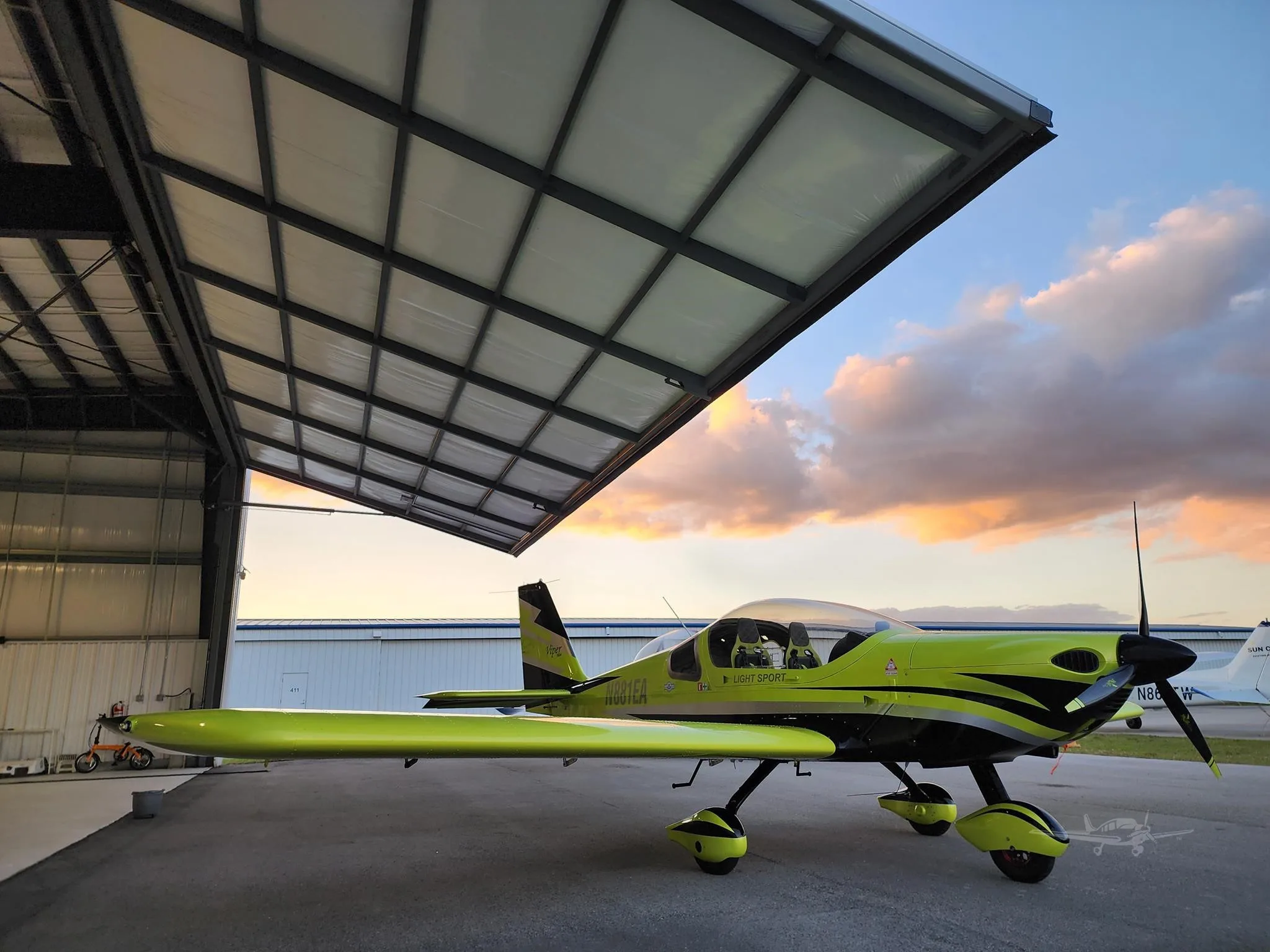 Exterior view of a 2025 TOMARK AERO VIPER SD4, N881EA.