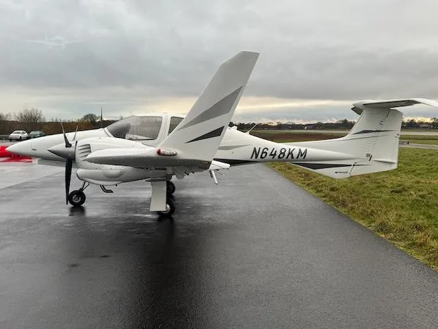 Exterior view of a 2008 DIAMOND DA42 TDI, N618KM.