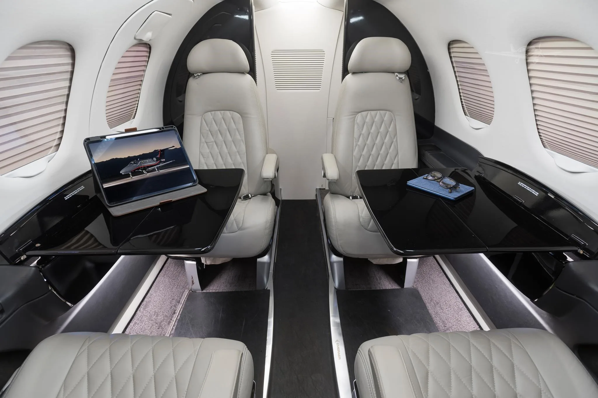 Cabin interior of a 2013 EMBRAER PHENOM 100.