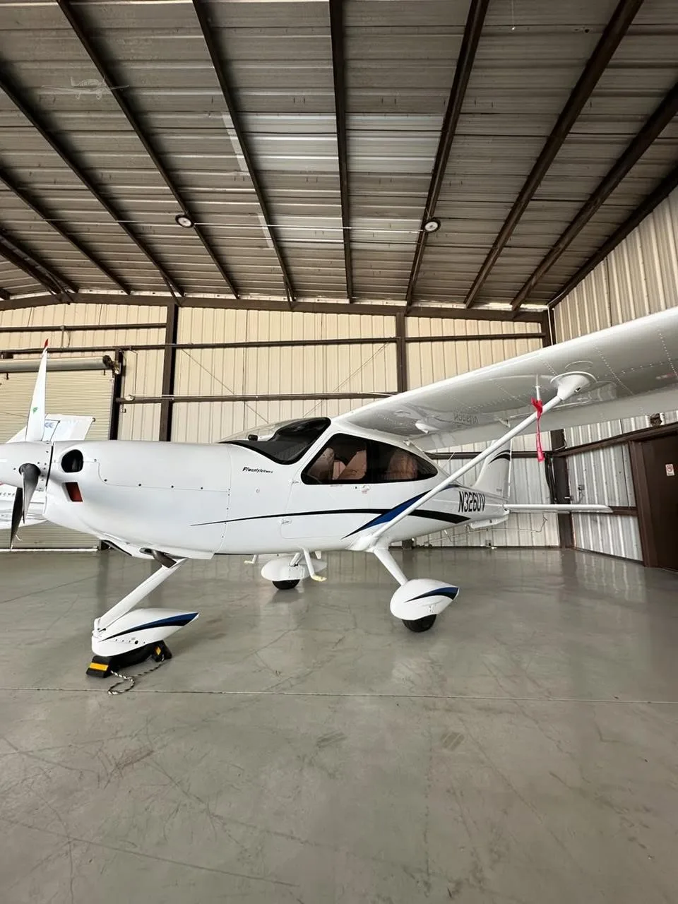 Exterior view of a 2025 TECNAM P2010 MKII, N326UV.