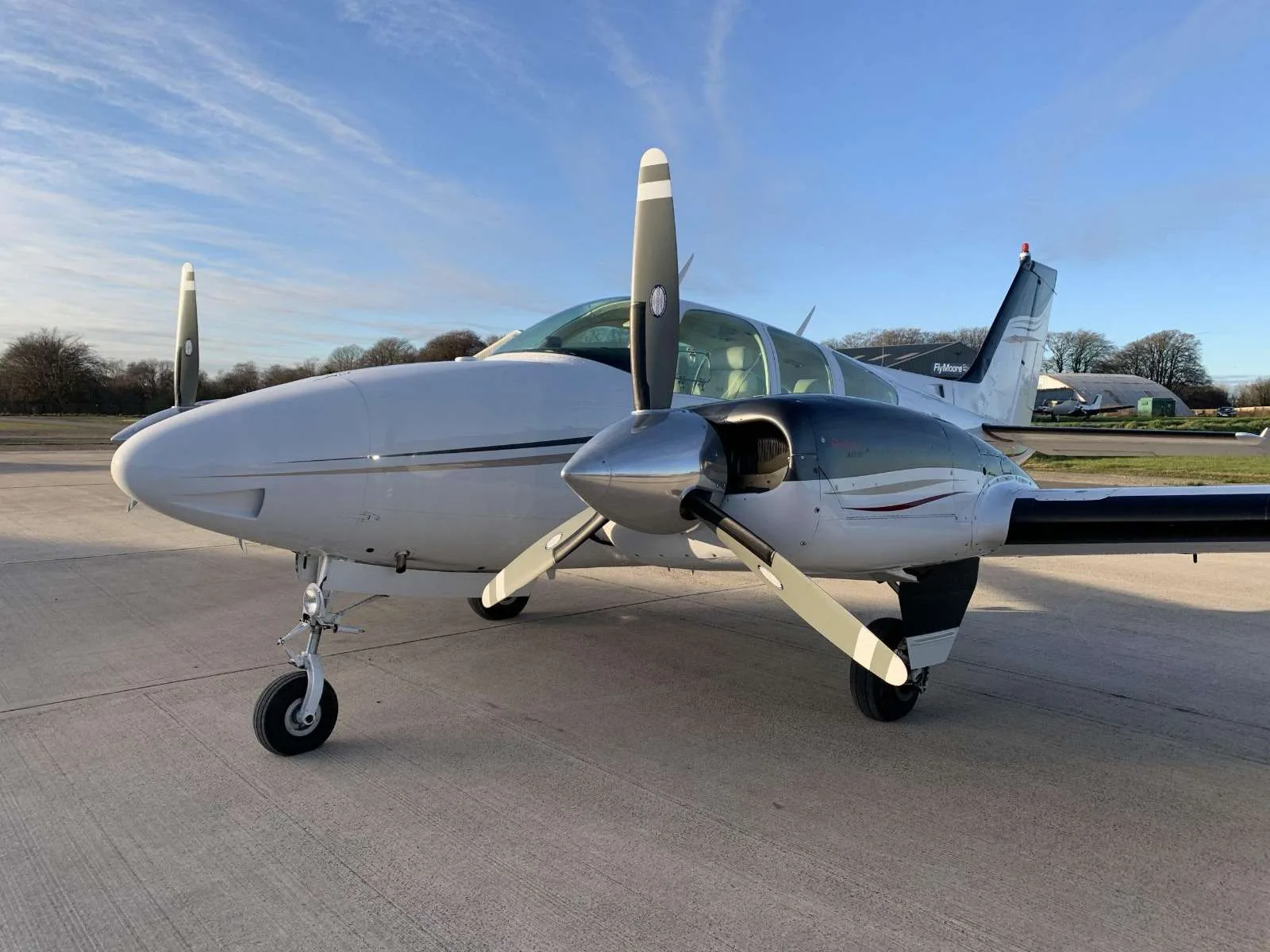 Exterior view of a 1976 Beechcraft Baron B55, G-DGST.