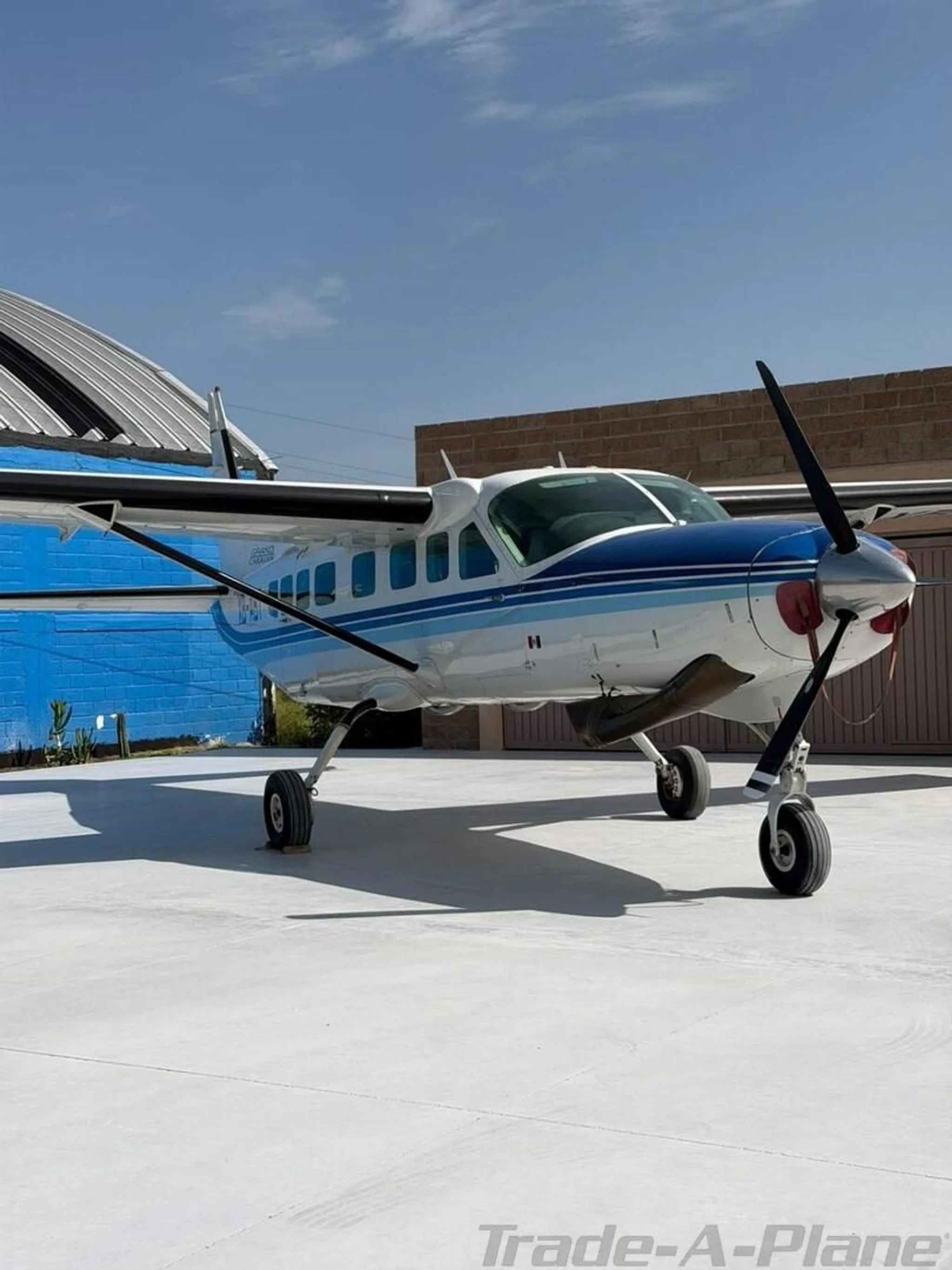 Exterior view of a 1995 CESSNA 208B GRAND CARAVAN, XB-ABT.