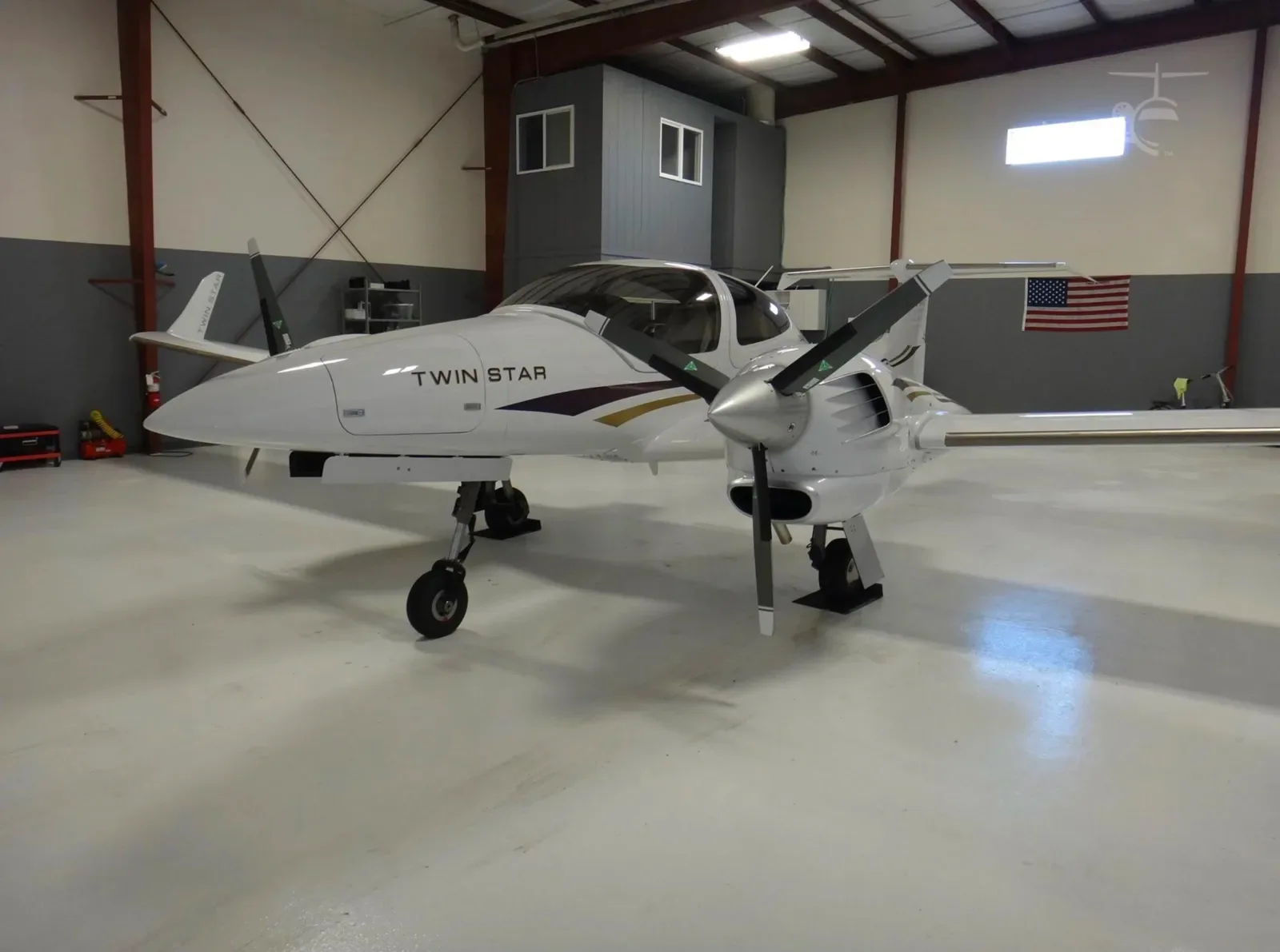 Exterior view of a 2007 Diamond DA42 Twin Star, G-COMS.